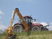 Tractor + armklepelmaaier Case puma 155+bos arm