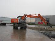 Mobiele graafmachine hitachi 140w-3