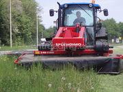 Tractor + schijvenmaaier New Holland T4050
